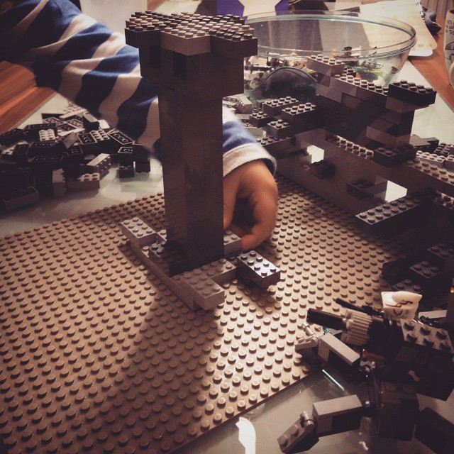 Building a #starwars #lego showcase with my junior. Awesome creative kids mind.